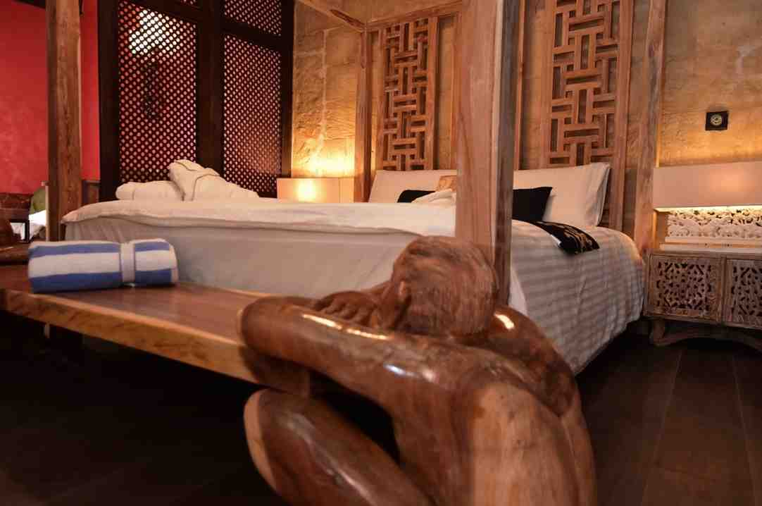 Bed frame and bench creation by baliartfurniture for 5 suite resort in Malta